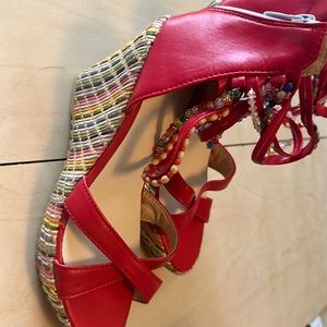 Platform wedge sandals with beaded ankle straps. Never worn.